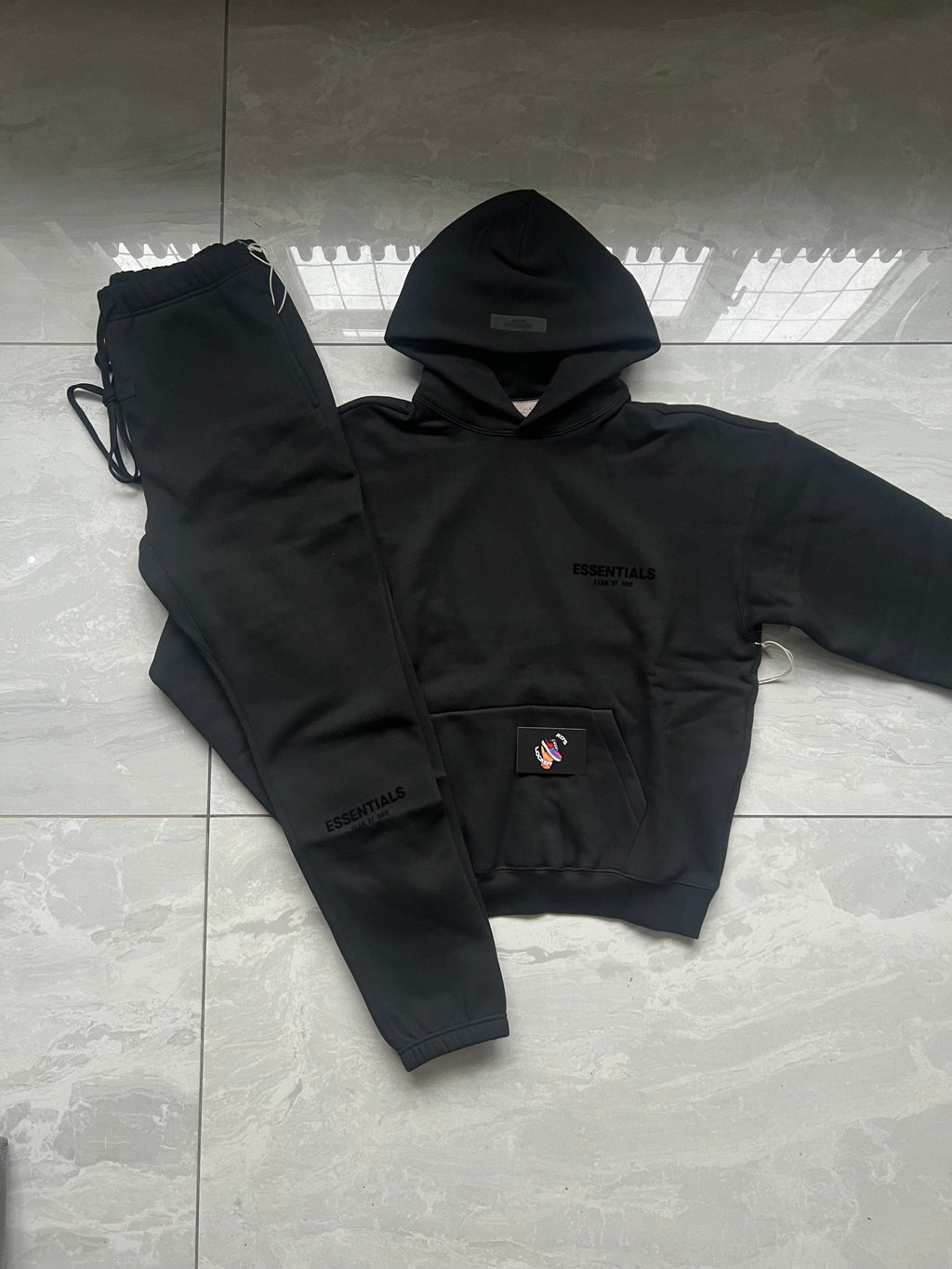 FEAR OF GOD ESSENTIALS SS22 STRETCH LIMO TRACKSUIT